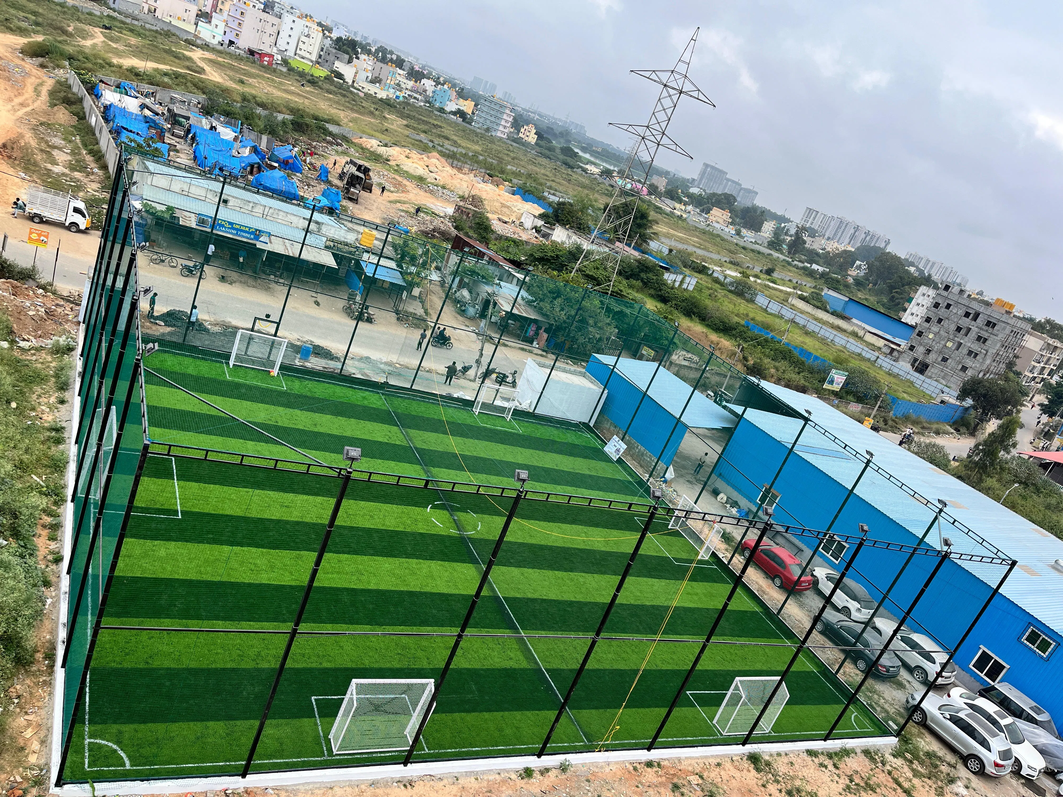 Training field at dusk with floodlights on