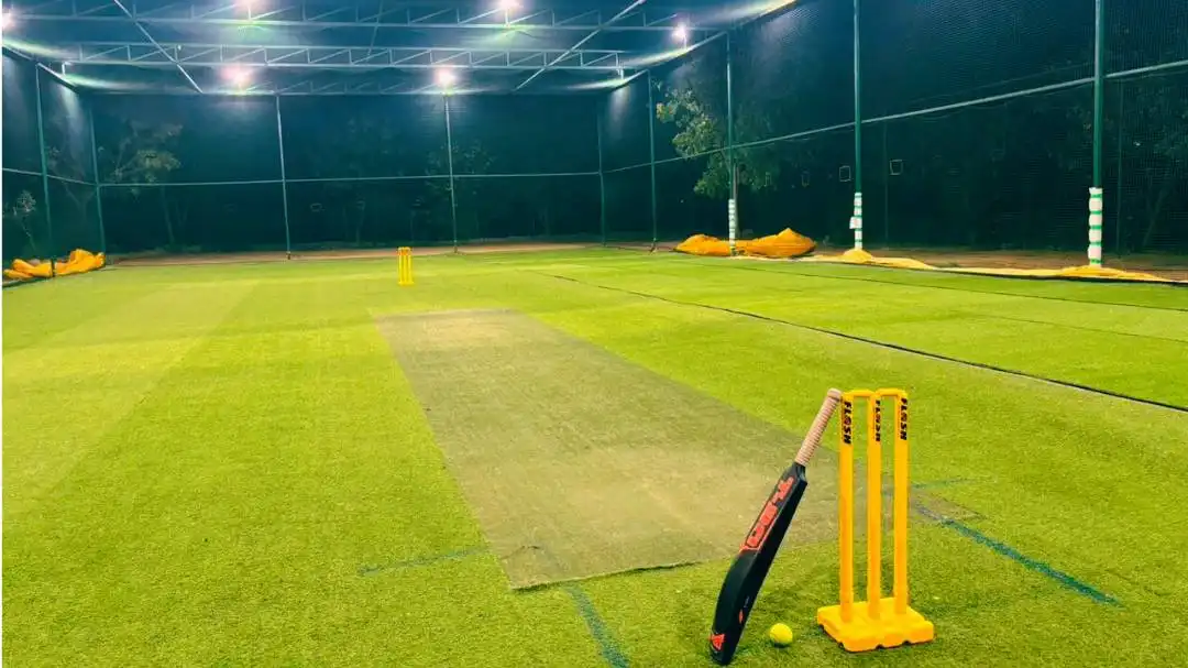 Training field at dusk with floodlights on